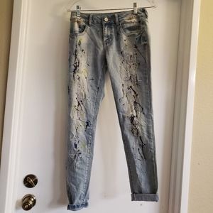 Boutique paint splatter jeans